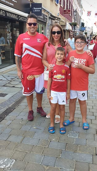 The whole of Gibraltar dresses in our national colours of red and white for National Day