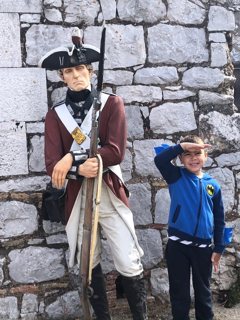 Jamie saluting one of the solider models at the City Under Siege exhibition